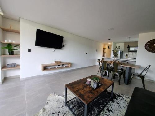 Guatape Apartment | Apartment with a hot tub and a view of Guatapé lake