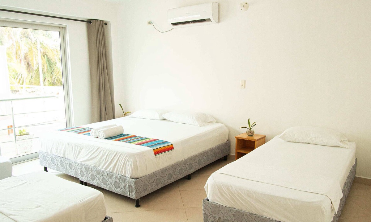 Covenas Hotel | Habitación Superior Familiar Con Balcón Cerca A La Playa