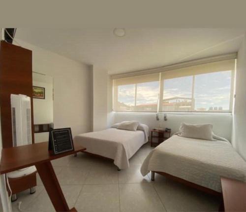 Moniquira Hotel | Hotel Manhattan Barbosa