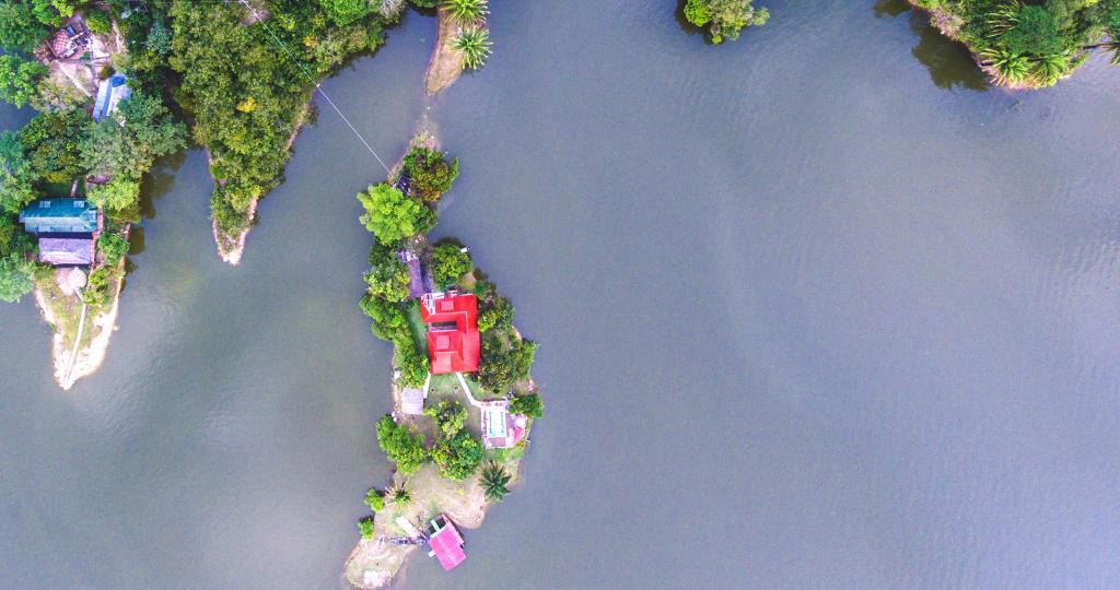 Purificacion House | Isla Privada en Prado Piscina y Deportes Náuticos - Cerca a Bogotá - Cerca a Ibagué