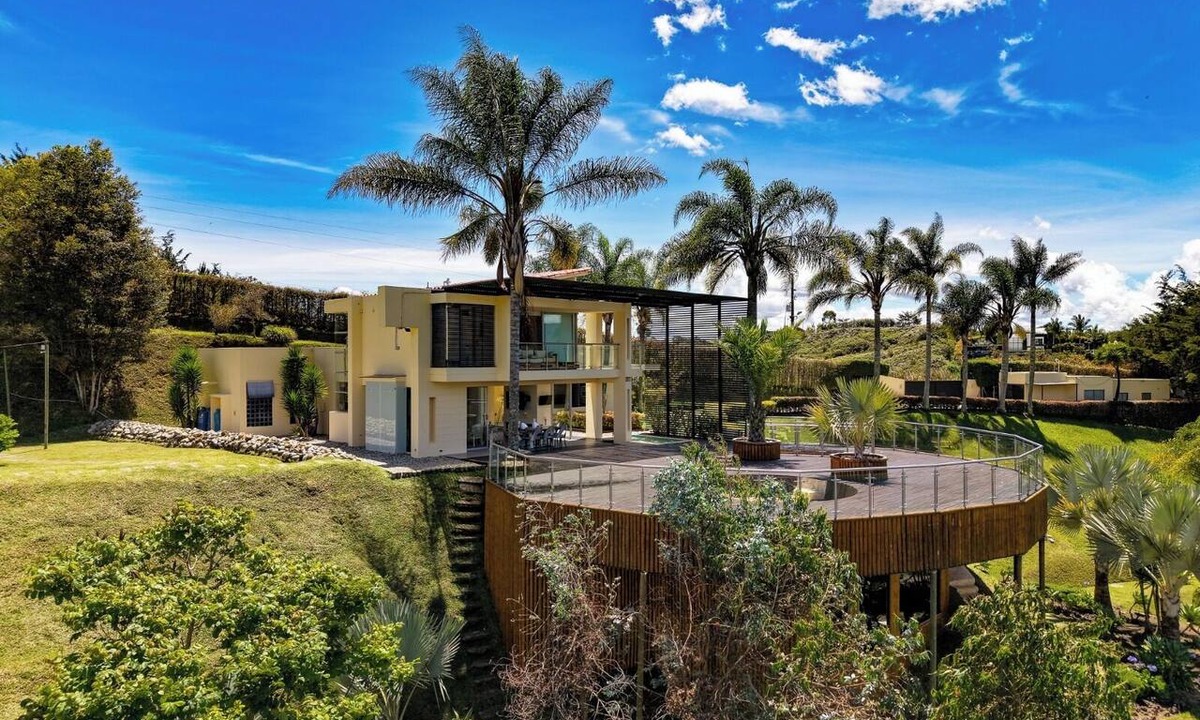 Guatape House | Luxury Lakefront Estate in Guatapé Private Beach, Dock, Helipad & El Peñol Views