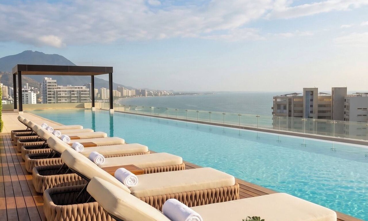 Pozos Colorados Apartment | Ocean View Balcony | AC, Wi-Fi, Pool, Sauna & Gym