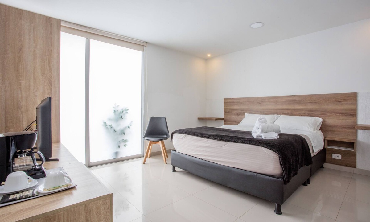 Modelia Hotel | Orange Wild