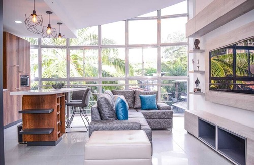 La Florida Apartment | 3 Bedroom Duplex PH Middle of Lleras Private Roof with Hot tub. No fees guests