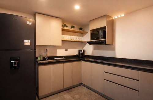 El Tesoro Apartment | 7th floor modern apartment near provenza