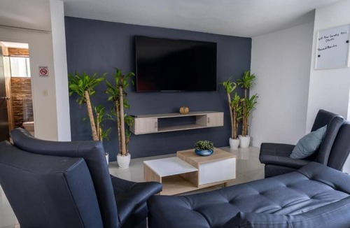 Zona Rosa Apartment | All-Inclusive Tourism Package with 2BR + Pool Table + Experiences