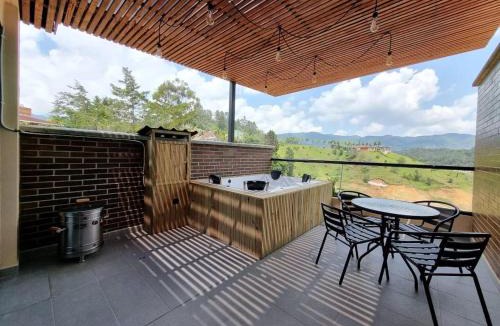 Guatape Apartment | Apartment with a hot tub and a view of Guatapé lake