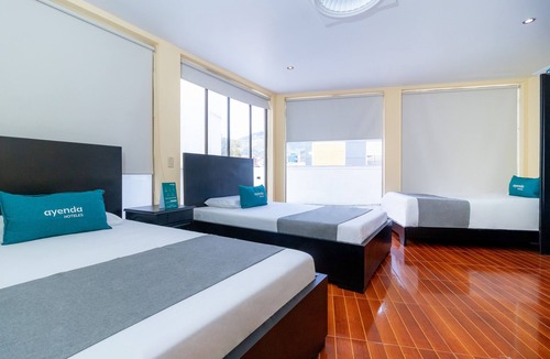 Barrios Unidos Hotel | Ayenda Normandy