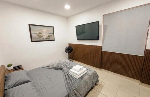 San Javier Apartment | CASA COMUNA Modern apartment steps from the Graffitour