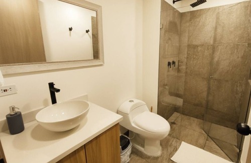 Urbanizacion Eliana Apartment | Comfortable suite with sea view | 2 minutes to airport | Pool, sauna, and more