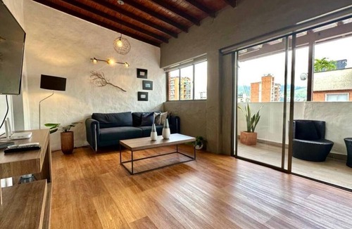Astorga Apartment | Cozy Penthouse next to Poblado Park with Large Balcony and A/C