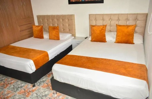 Suba Bed & Breakfast | Hotel Flamante Bulevar - Room 2 double beds with private bathroom