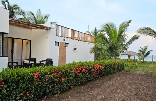 Monitos Cabin | House on the Beach, Oceanfront, Suite-Style House