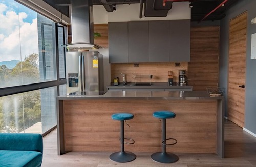 Envigado Apartment | Industrial Chic Apartment with Views of Green Antioquia