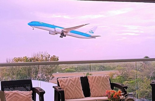 Crespo Apartment | Liz's Balcony/Airplane Show and Caribbean Ocean Views & Airplane Show