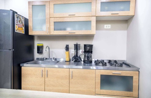 Zona Rosa Apartment | LLeras Park 5 Bedroom apartment with arcade machine
