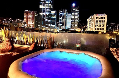 Santa Ana Apartment | Loft + private terrace with jacuzzi, fireplaces, cinema, panoramic view