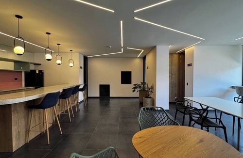 Quinta Paredes Apartment | Loft with a private garden and coworking space near Corferias and the U.S. Embassy