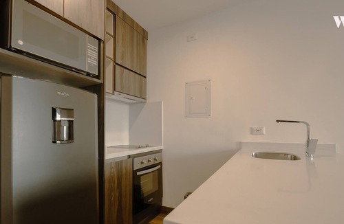 Chico Norte III Apartment | Modern 1BR in Luxury Building with Terrace in Chico