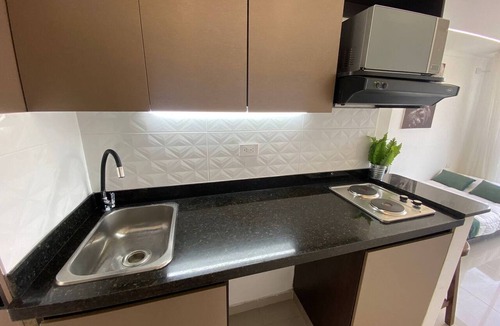 Belen Apartment | New Nomad Nest PH balcony, AC, kitch, metroplus