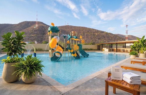 Pozos Colorados Apartment | Ocean View Balcony | AC, Wi-Fi, Pool, Sauna & Gym