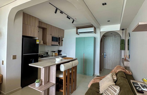 Urbanizacion Eliana Apartment | Oceanfront Suite with Coworking & Pool