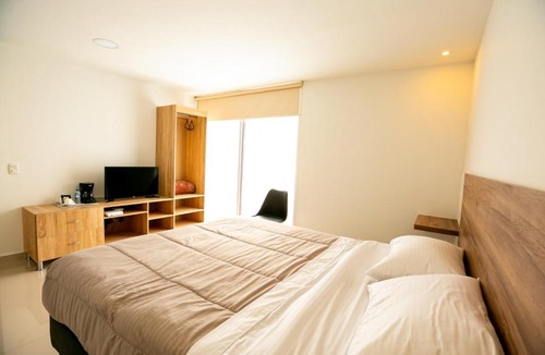 Modelia House | Orange wild BY Laurel hotels - Aeropuerto
