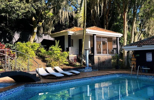 El Castillo House | Private Poblado Tropical Estate 12BR Pool 18-Person Jacuzzi Walk to Golden Mile