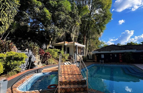 El Castillo House | Private Poblado Tropical Estate 12BR Pool 18-Person Jacuzzi Walk to Golden Mile