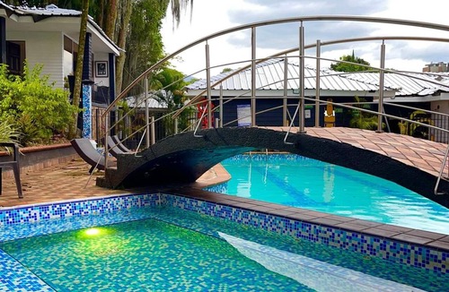 El Castillo House | Private Poblado Tropical Estate 12BR Pool 18-Person Jacuzzi Walk to Golden Mile
