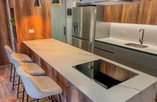 Retiro Apartment | Quarzzo Suites by NOWA