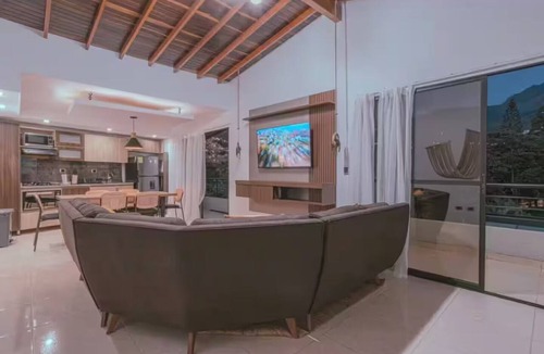 Buenos Aires House | Stylish Boho Apartment with Mountain Views in Medellín