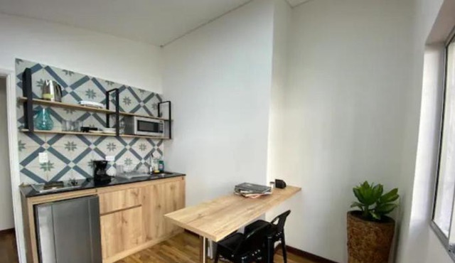 Apartamento cerca al centro comercial Santafé A105 By Roots Rentals