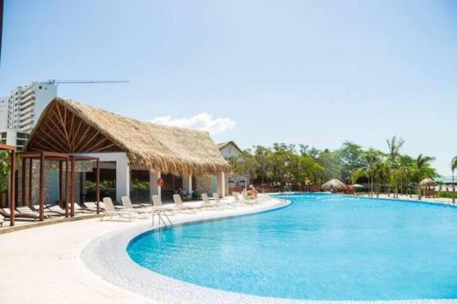 Apartamento Encantador Samaria Club de playa, 3 alcobas 6 personas Playa Privada Considerar manillas de club de playa