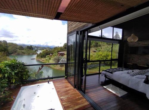 Cabaña con jacuzzi y acceso al embalse - Portum II in El Peñol
