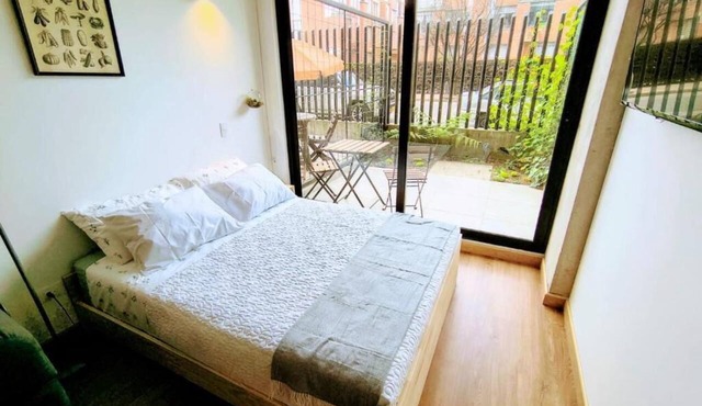 Loft with a private garden and coworking space near Corferias and the U.S. Embassy