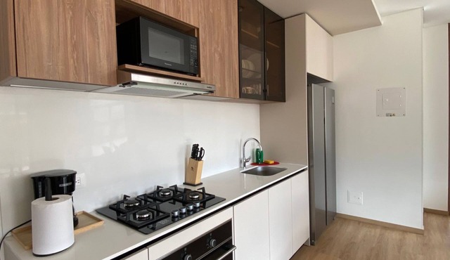 Modern and spacious apartment in a prime location near Parque de la 93.