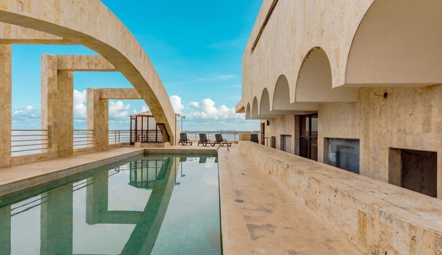 Oceanfront 4-Bedroom Triplex Condo with Panoramic Views