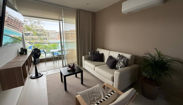 Spectacular 1-bedroom apartment overlooking the endless Crystal Lagoon Beach