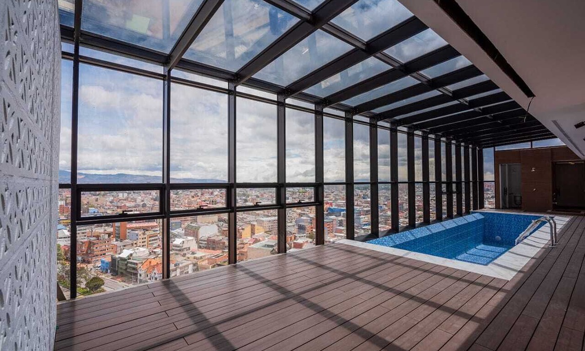 Antiguo Country Apartment | Elegant apartment with view of the city, mountains, 500 MB, swimming pool, gym and spa