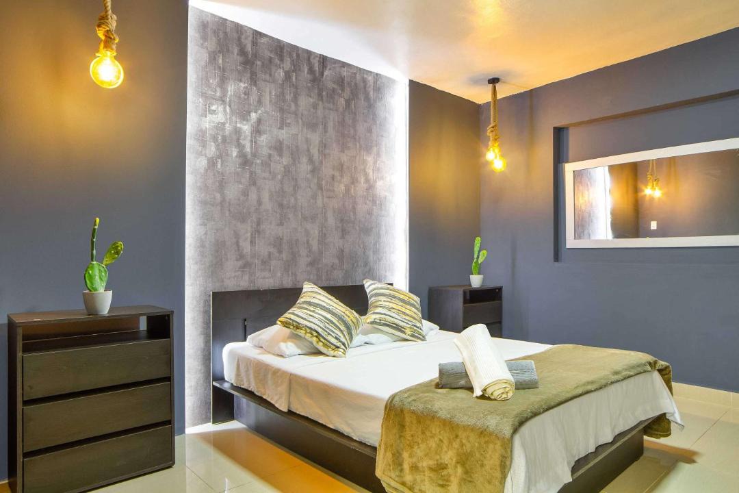 Zona Rosa Apartment | 5 bedroom, with Arcade machine and foosball, 1 block from Lleras park P3