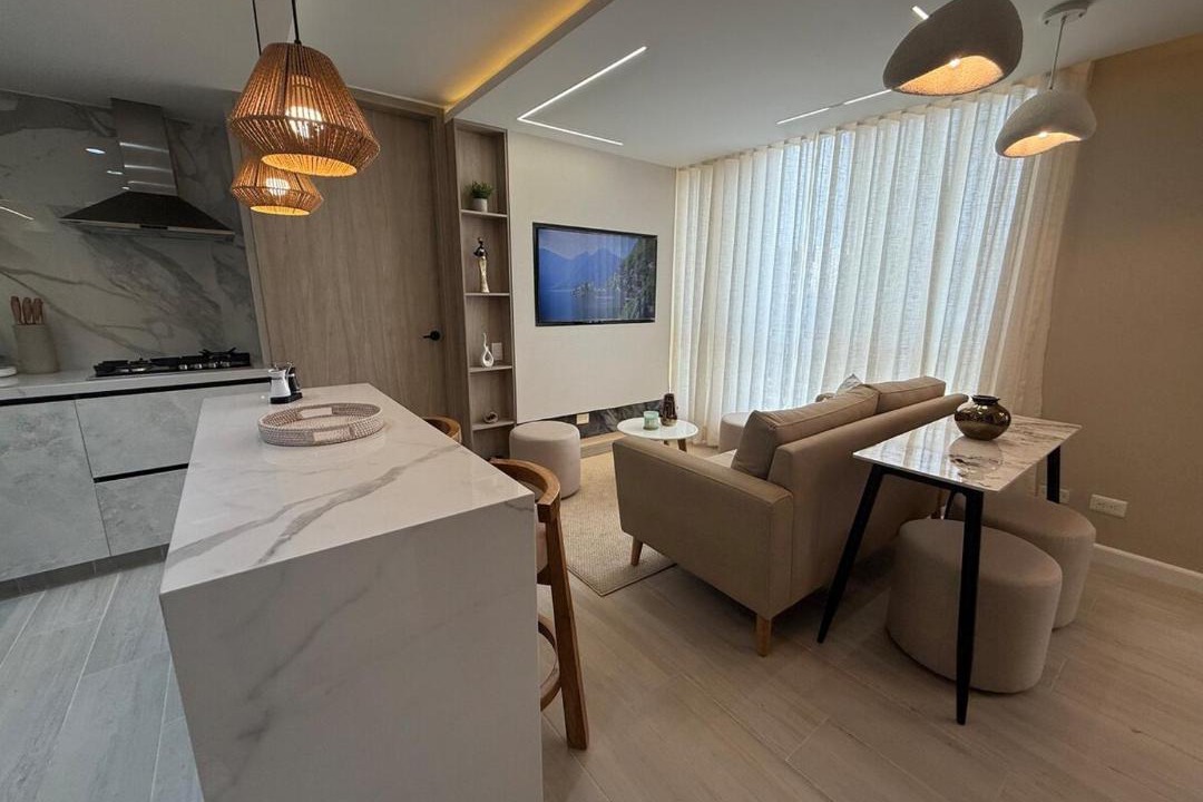 Riomar Apartment | Open Floor Chic Interior Design Pool Full Kitchen