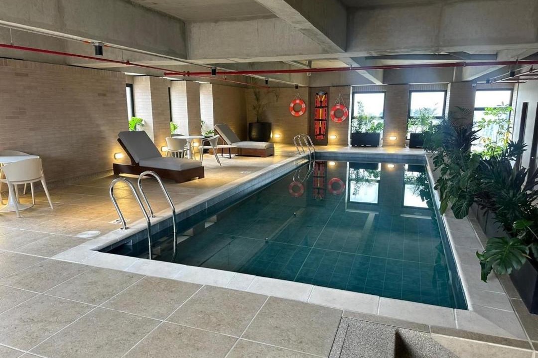 Campin Apartment | Manzana 3 building next to the Movistar Arena, the Camping site, and Simon Bolivar park
