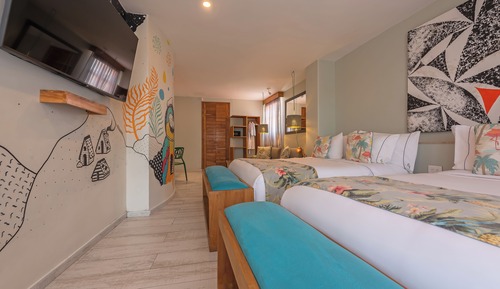 Deluxe Quadruple Room, 2 Queen Beds, Balcony, City View
