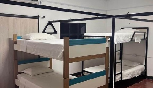Single Bed in Dormitory Room