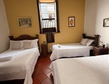 Economy Quadruple Room with Shared Bathroom