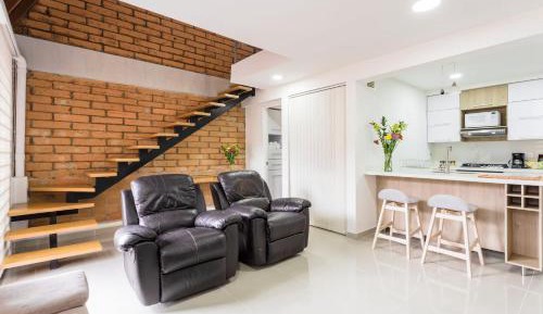 One-Bedroom Apartment with Balcony and City View