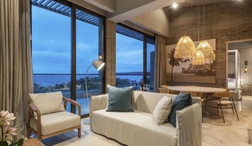 Two-Bedroom Caribbean Family Penthouse with One King Bed, Two Twin Beds and Ocean View