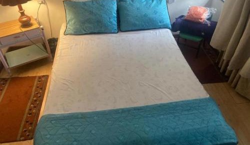 Queen Room with Shared Bathroom