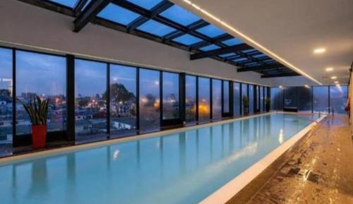 One-Bedroom Apartment with Balcony and City View